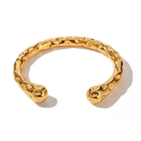 Pulsera Zeus brazalete abierto con textura martilleada en oro 18K